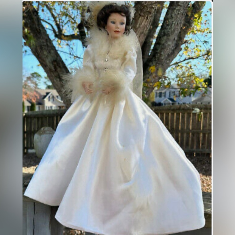 The Ashton Drake Galleries Winter romance porcelain doll
